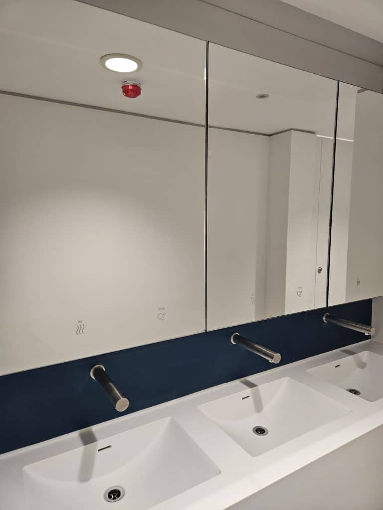 Multi Surface Fabrications Mirror Box Unit. Pair with Solid Surface washtroughs to level up your washroom.